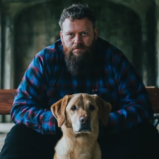 will atherton with a white lab