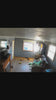 a video of a belgian malinois that a customer took destroying the house after it got out of its wire crate